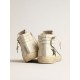 Slide in beige nappa with green laminated leather star and flash